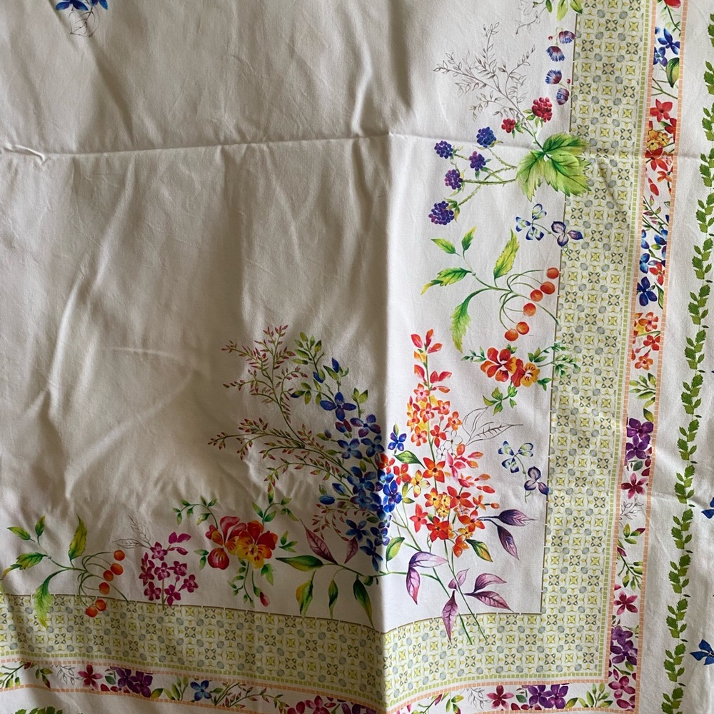 Zara Home White cotton Tablecloth with decorative floral print.